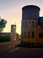 Sunrise (28 September 2024) @ 6:47 a.m. View to the east-northeast from Camp Street showing (L to R) Catholic church, Methodist church, old Catholic hospital.