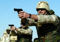 Killer Poke infects pistol operating systems, guns fail to fire, remain useful for pistol-whipping.