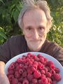 Self portrait with raspberries (12 July 2023).